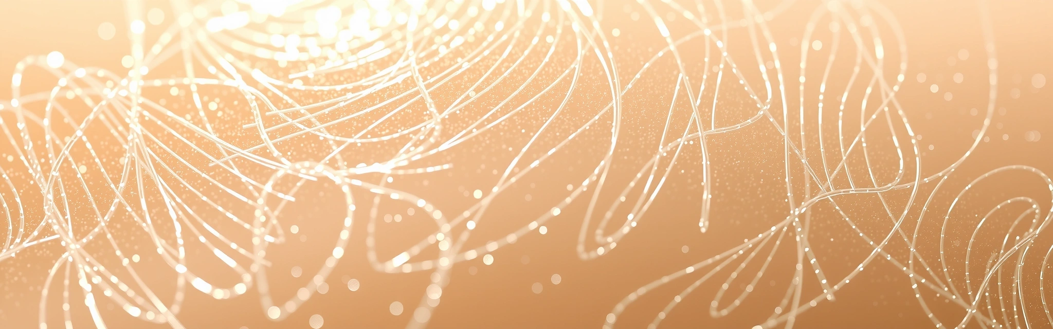 A hand holding a freshly picked herb with dew drops, against a blurred lush green background, symbolizing natural origin.